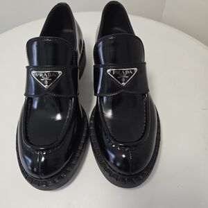 Prada Metal Triangle Black Leather Loafers, Size IT38|US 8